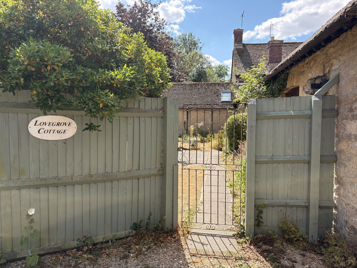 Lovegrove Cottage sign and wrought-iron garden gate